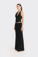 Black MS. Pleat corset top by Stolen Stores, featuring structured pleats and fitted design, worn by a model in the image.