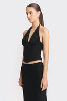 Black MS. Pleat corset top by Stolen Stores featuring pleated design and structured fit, shown on a model.
