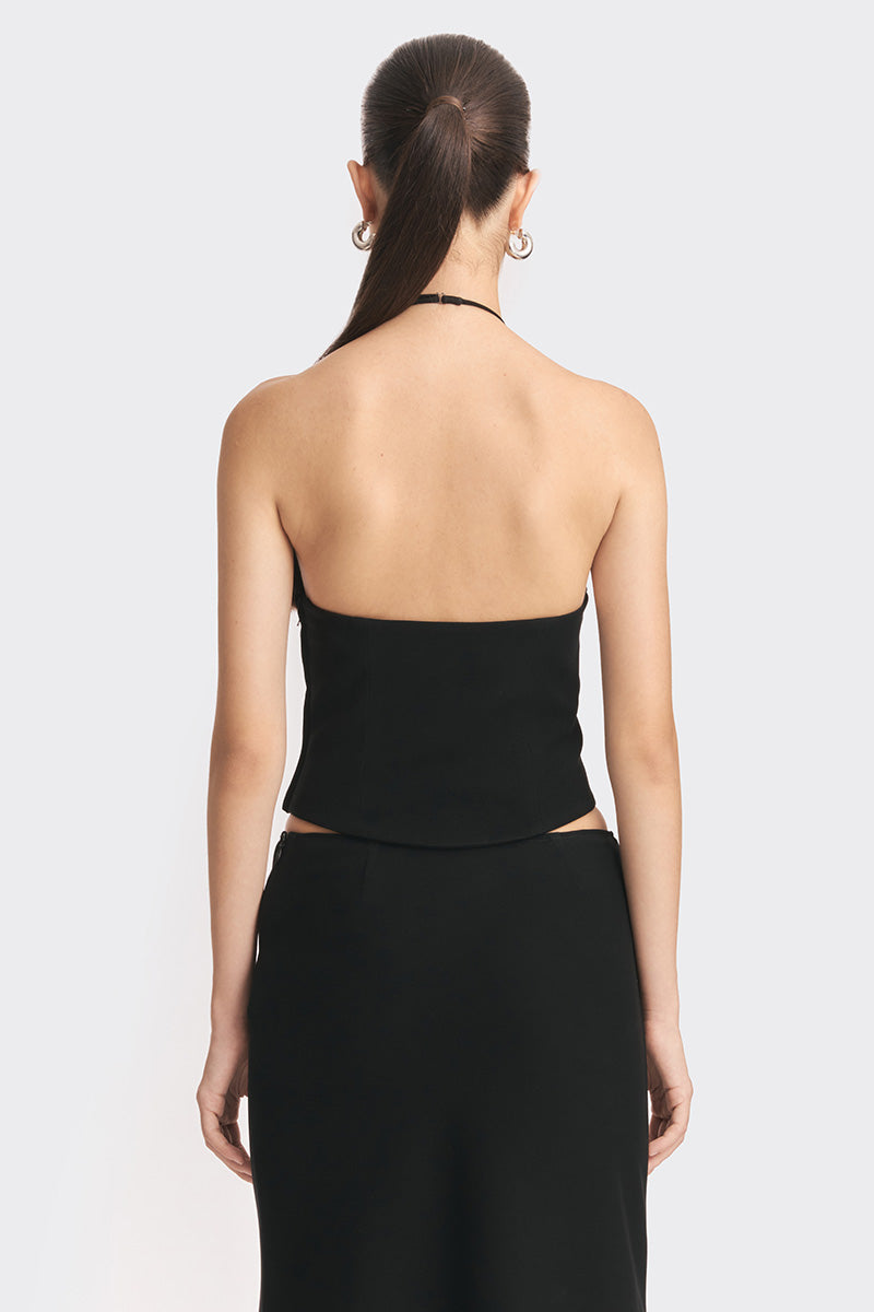 Black MS. Pleat corset top by Stolen Stores, featuring pleated design and structured fit, shown on model.