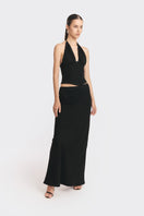 Black MS. Pleat corset top by Stolen Stores, featuring structured pleats and a fitted design, shown on a model.