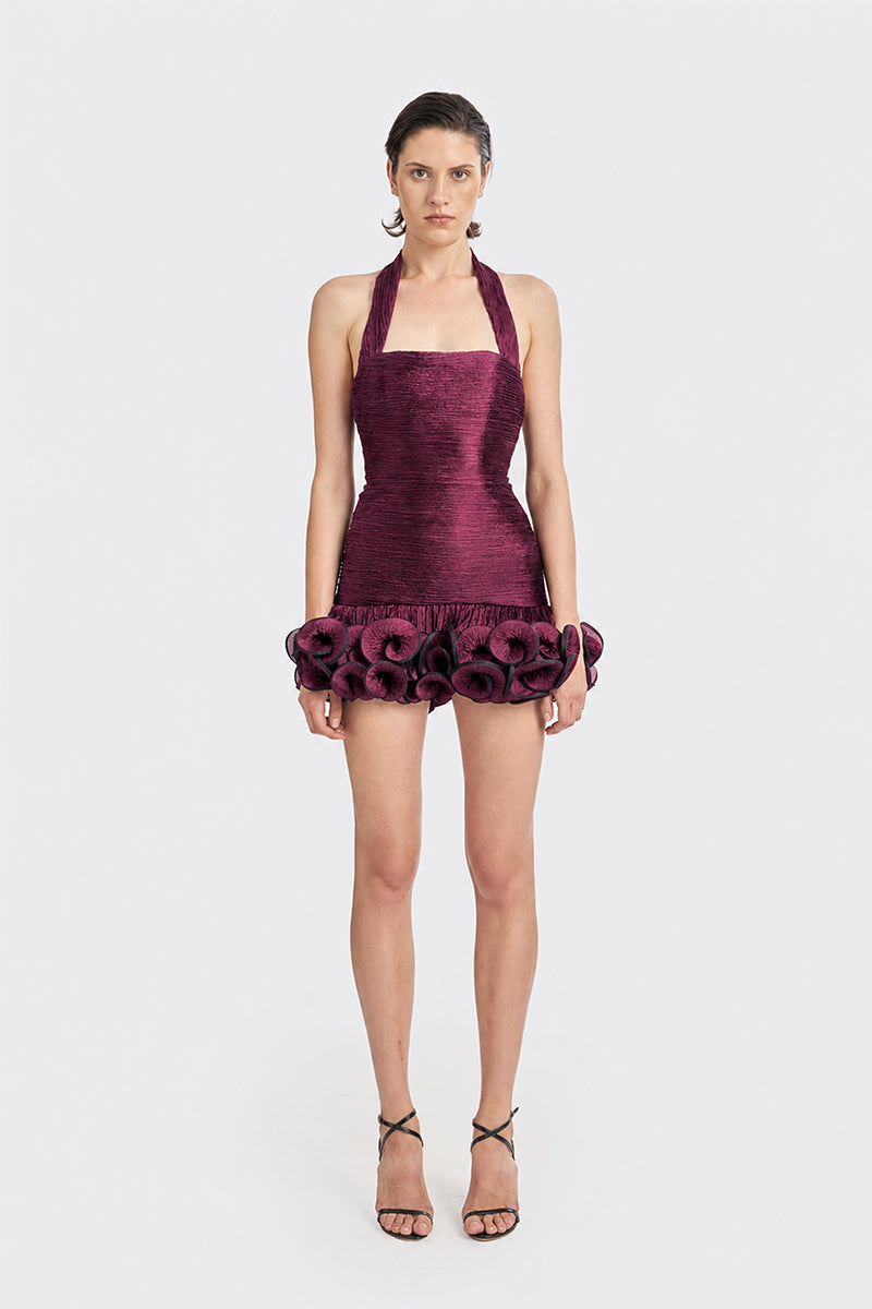 Dark purple CULT MIA X Stolen Stores Ms. Tutu halter mini dress displayed on a model, showcasing its stylish design and fit.