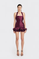 Dark purple CULT MIA X Stolen Stores Ms. Tutu halter mini dress displayed on a model, showcasing its stylish design and fit.
