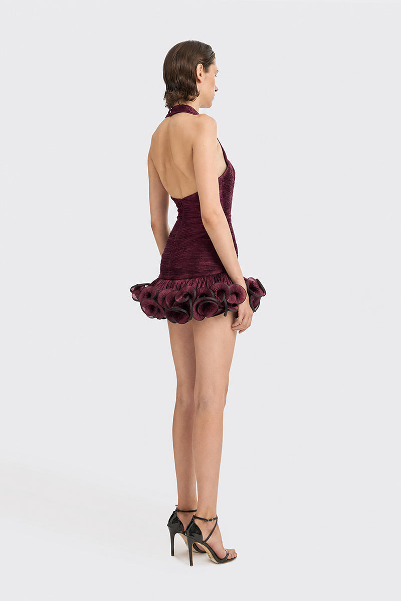Dark purple CULT MIA X STOLEN STORES Ms. Tutu halter mini dress displayed on a model.