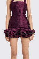 Dark purple CULT MIA X STOLEN STORES Ms. Tutu halter mini dress on model, showcasing stylish sleeveless design and fitted silhouette.