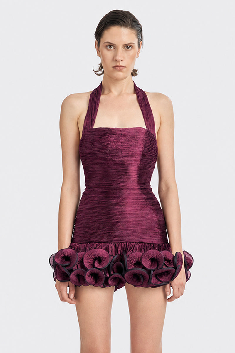 Dark purple Cult Mia X Stolen Stores Ms. Tutu halter mini dress displayed on a model, showcasing stylish and vibrant design.