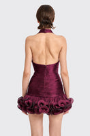 Dark purple CULT MIA X STOLEN STORES Ms. Tutu halter mini dress, stylish sleeveless design on model.