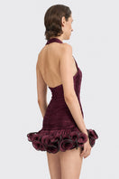 Dark purple CULT MIA X STOLEN STORES Ms. Tutu halter mini dress displayed on a mannequin, showcasing its stylish design.