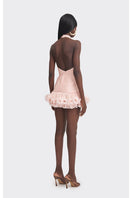 Stolen Stores peach V-neck mini dress featuring a fitted silhouette and short sleeves, perfect for casual or semi-formal occasions.