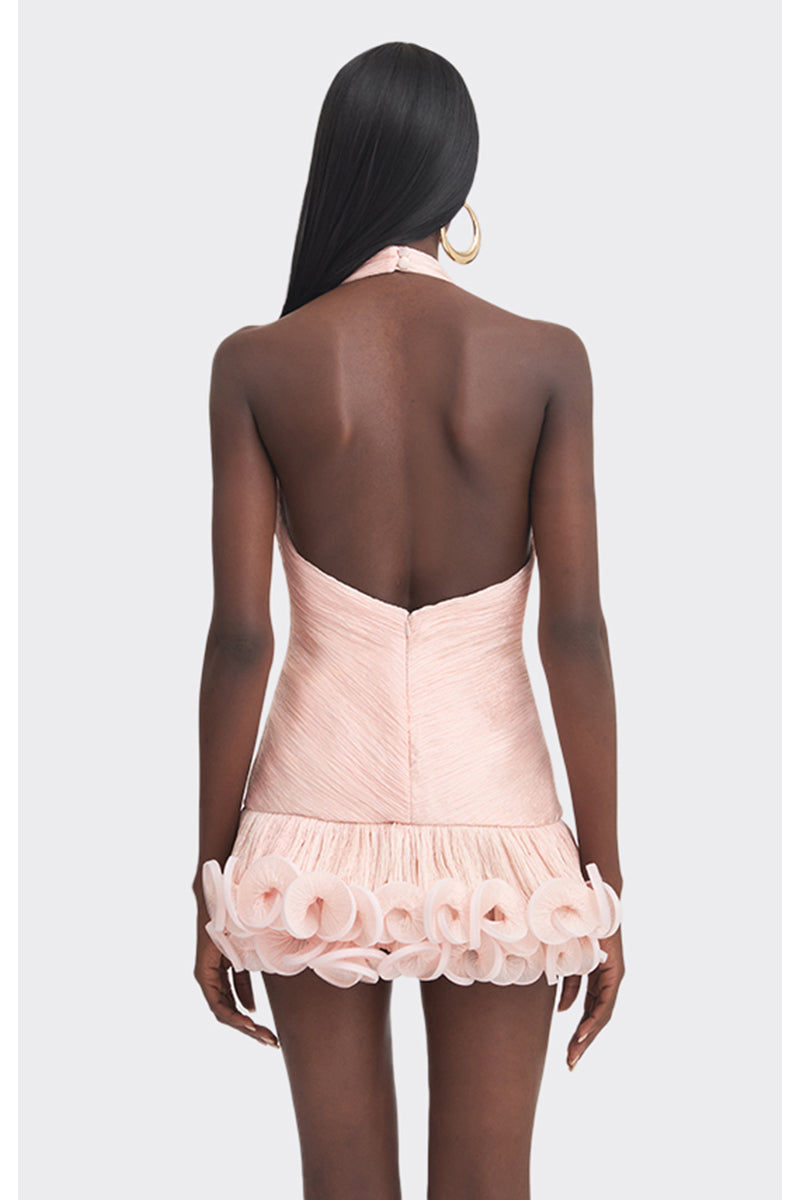 Stolen Stores peach V-neck mini dress featuring a fitted silhouette, styled with a playful and feminine look.