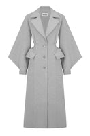Gray wool coat for women from Stolen Stores' Ms. Doll collection, shown hanging on a wooden hanger.
