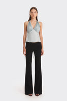 Dusty blue pleated top from Stolen Stores featuring a stylish, flowy design perfect for casual or dressy occasions.