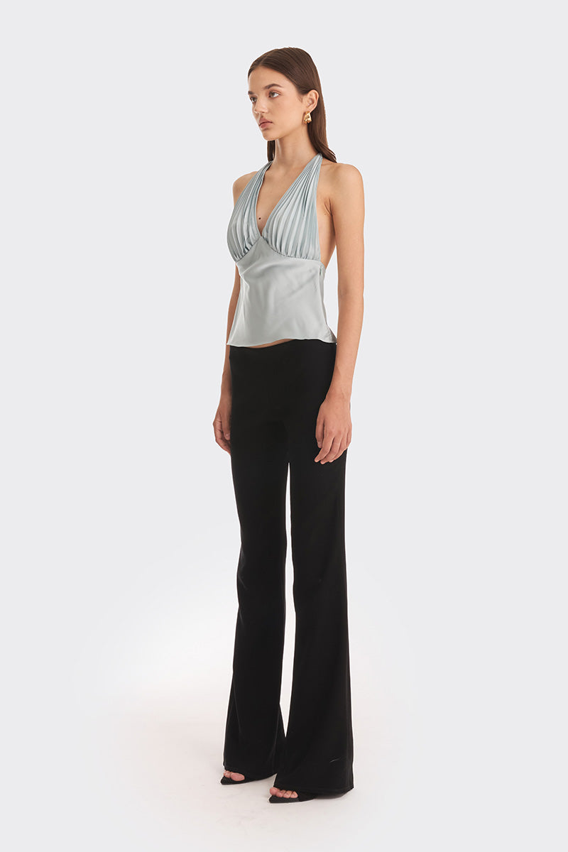 Dusty blue MS. Pleat top by Stolen Stores, featuring a stylish pleated design and lightweight fabric for a chic look.