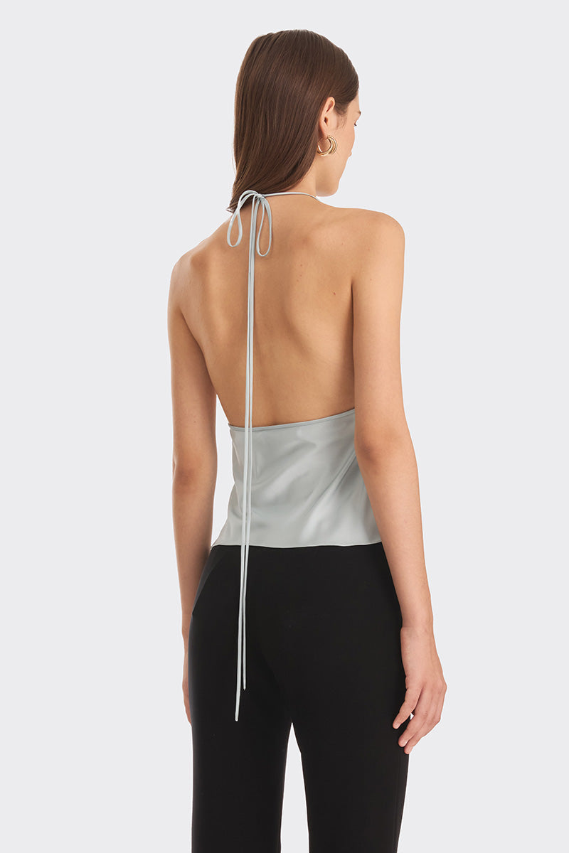 Dusty blue pleated top from Stolen Stores, featuring a stylish, flowy design perfect for casual or dressed-up looks.