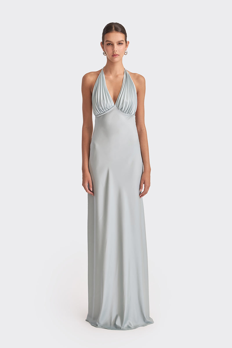 Dusty blue MS. Pleat maxi dress by Stolen Stores, featuring flowing fabric and pleated design, displayed on a hanger.