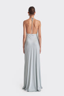 Dusty blue Stolen Stores MS. PLEAT maxi dress with pleated design, flowing silhouette, and elegant style, displayed on a hanger.