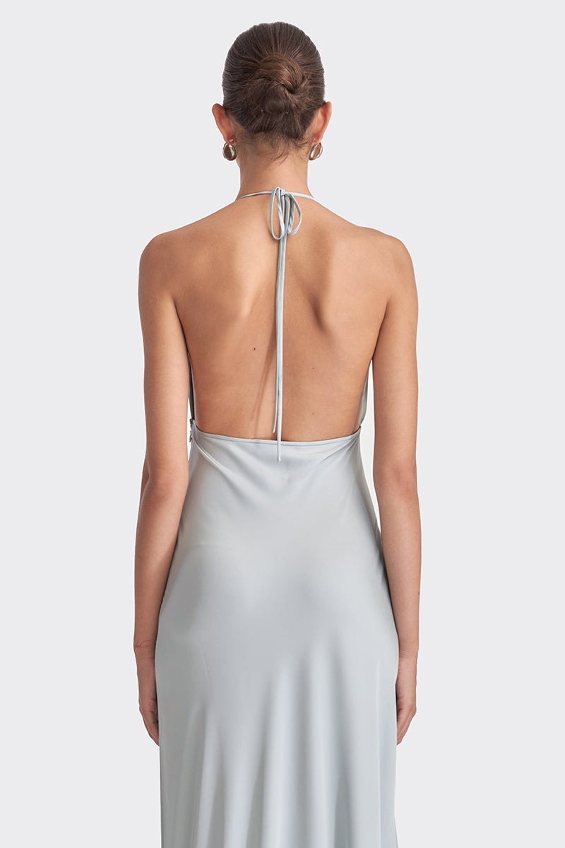 Dusty blue MS. Pleat maxi dress by Stolen Stores, flowing fabric and pleated design, shown on a model.