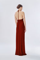 Elegant rose apple pleated gown by Stolen Stores, featuring a flowing maxi dress design with intricate pleats.