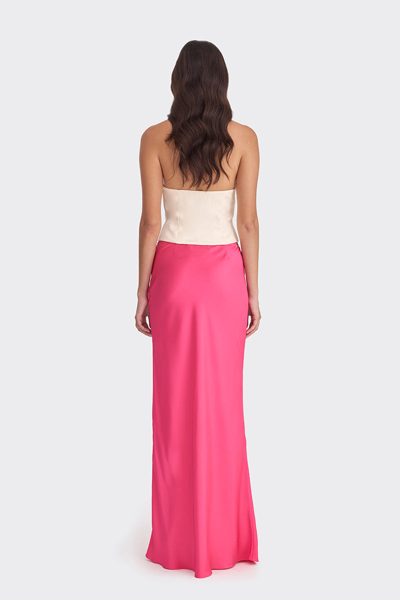 Hot pink and beige bustier top from Stolen Stores featuring a two-tone, fitted design with heart-shaped details.