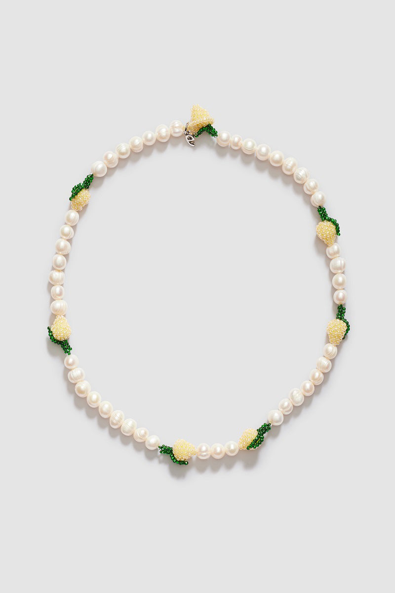 Pura Utz multi-pearl lemon necklace featuring multiple pearl beads in a vibrant yellow lemon shape, stylish jewelry accessory