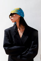Silk MUNIR MOUSSARD scarf by Amel Batita featuring a 90-inch bandana style with intricate patterns and vibrant colors.