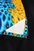 Elegant silk Mounir Moussard scarf by Amel Batita featuring intricate patterns and vibrant colors.