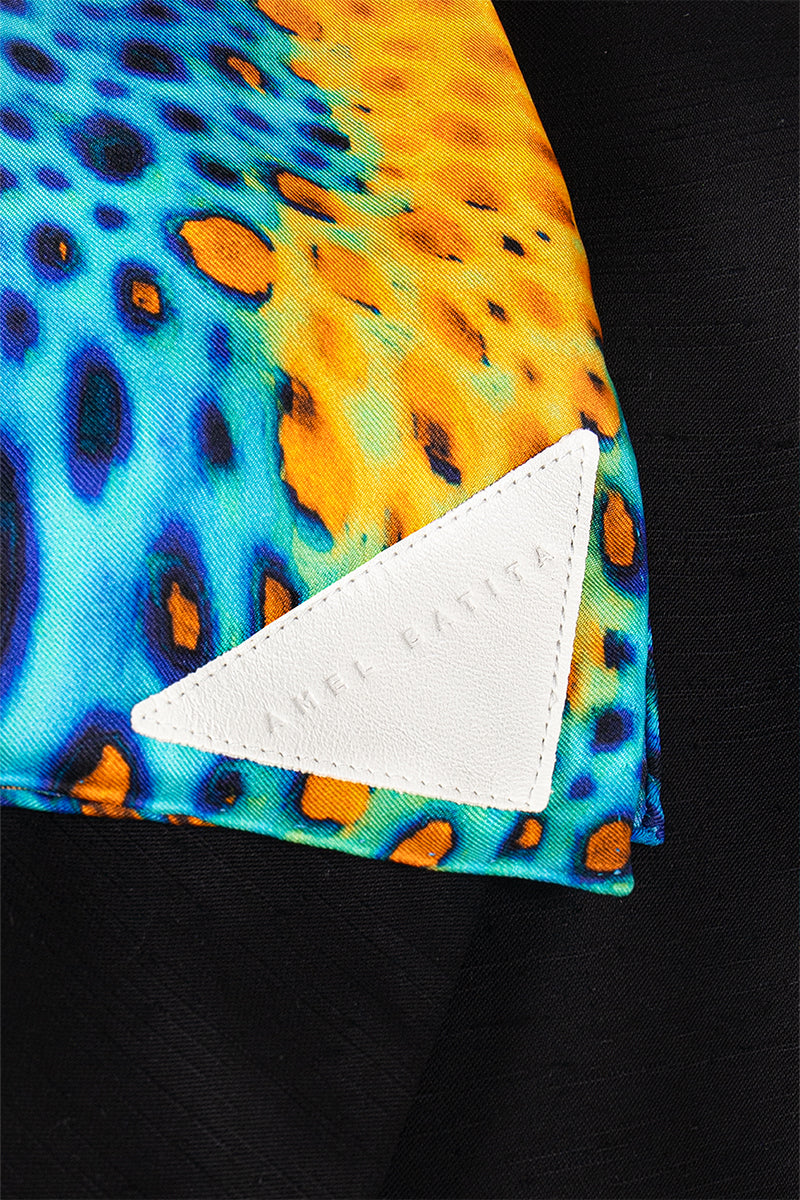 Elegant silk Mounir Moussard scarf by Amel Batita featuring intricate patterns and vibrant colors.