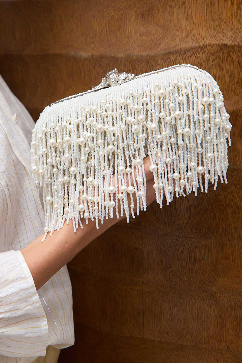 White Murex Pearl Cascade Box Clutch by Sarah's Bag featuring intricate pearl detailing and a sleek, elegant design.