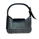 JC Pajares NAHI wicker and leather top handle bag with woven wicker body and leather accents on a white background.