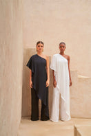 Black Nahir jumpsuit by Tinta Latina, stylish one-piece outfit with sleek design and fitted silhouette.