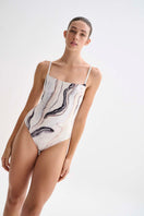 Nelblu Tierra One-Piece Swimsuit featuring a stylish design and comfortable fit, perfect for beach or pool wear.