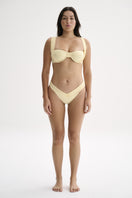 Nelblu MAREA bikini bottom full coverage in blonde, showing the beige swimwear with a smooth fit and full rear coverage.