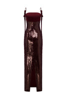 Back view of the NERGID burgundy and wine gown by MOON / HAKAAN YILDIRIM, featuring elegant fabric and sophisticated design.