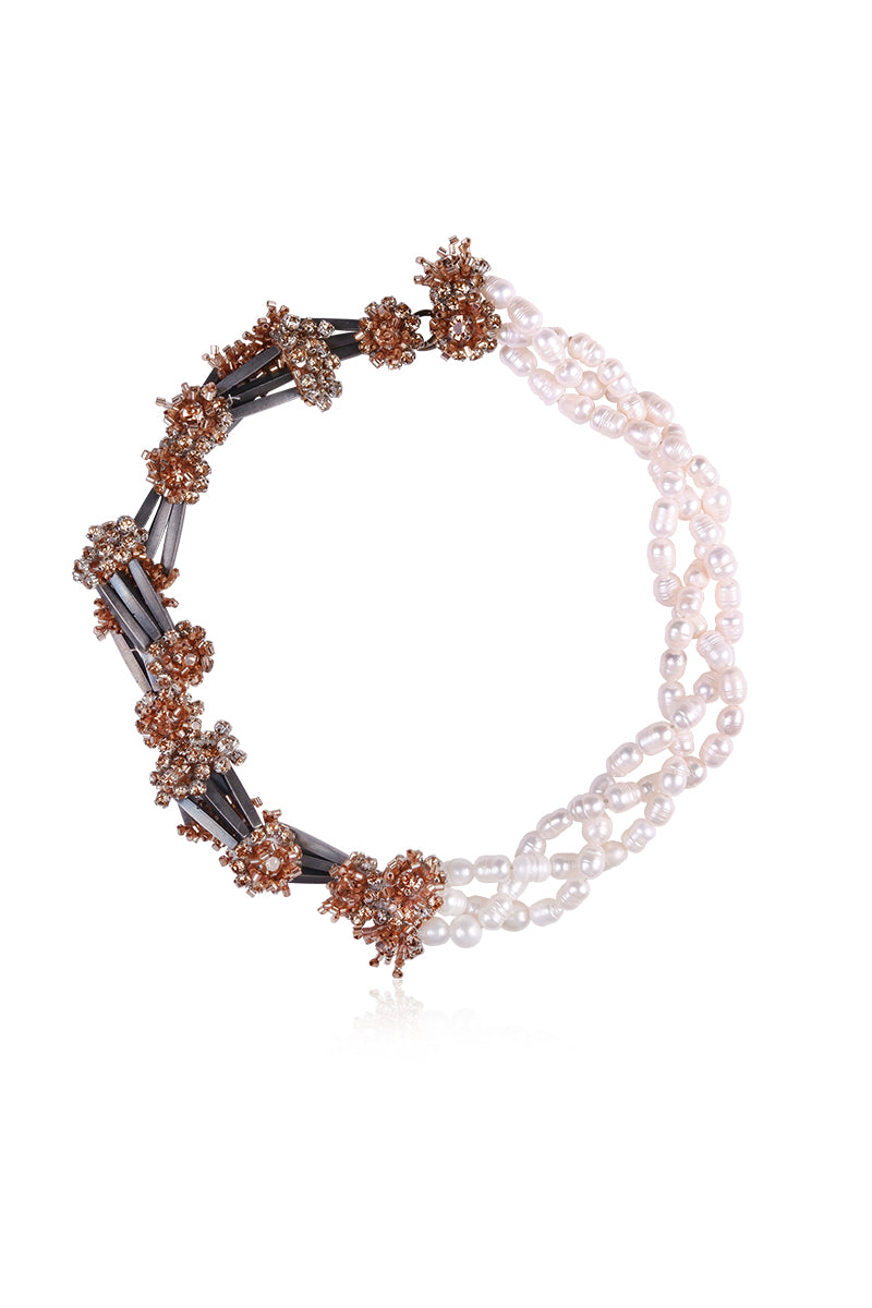 Golden Luxe Necklace by Aidan & Ice featuring a elegant gold chain and pendant on a white background.