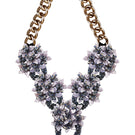Gray Greta necklace by Aidan & Ice featuring a stylish chain and pendant, displayed on a neutral background.