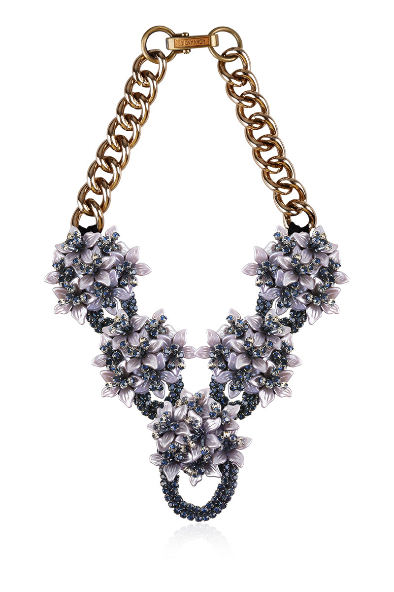 Gray Greta necklace by Aidan & Ice featuring a stylish chain and pendant, displayed on a neutral background.