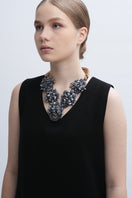 Aidan & Ice Gray Greta necklace featuring a sleek gray pendant on a delicate chain, styled for elegant accessorizing.