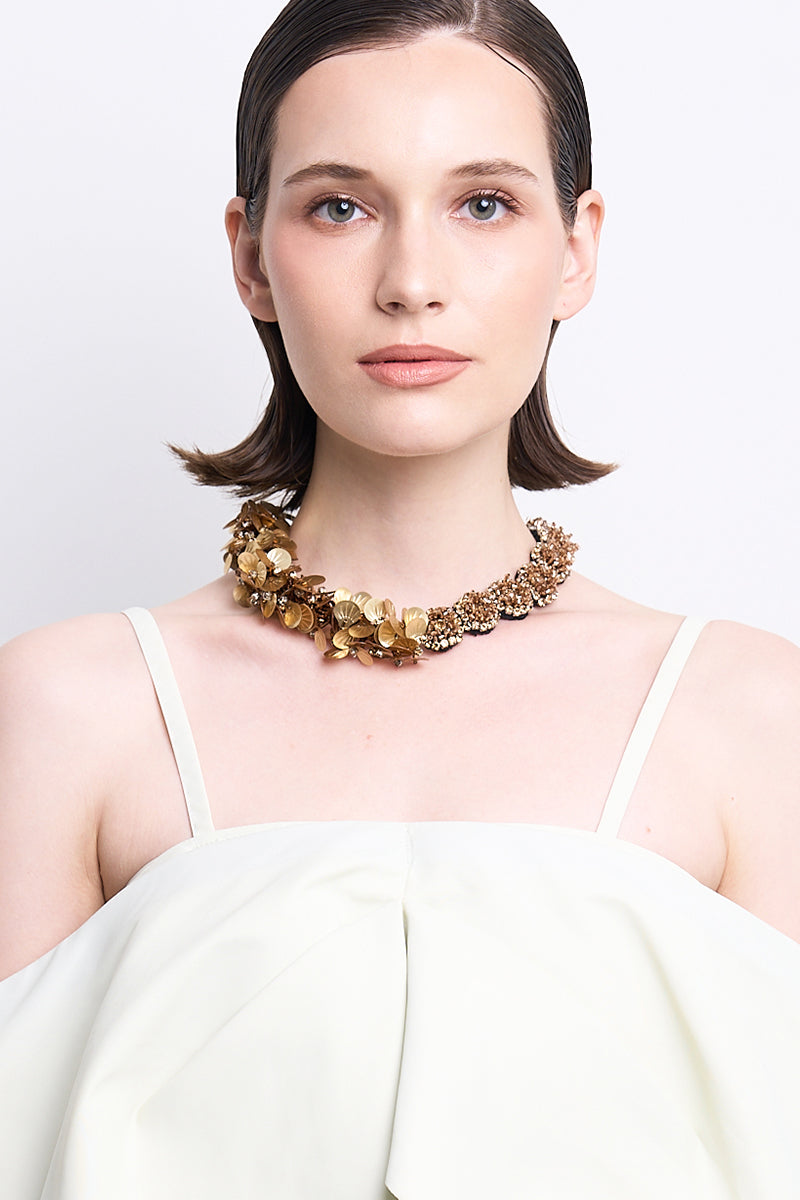 Aidan & Ice Ivy Golden Necklace featuring a delicate gold chain with an elegant ivy leaf pendant.