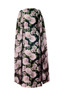 Nur Karaata Marianne maxi dress in flowing fabric, featuring a stylish design perfect for elegant summer occasions.