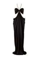 Nur Karaata Alice Pearl maxi dress featuring elegant pearl accents and flowing fabric, perfect for sophisticated occasions.