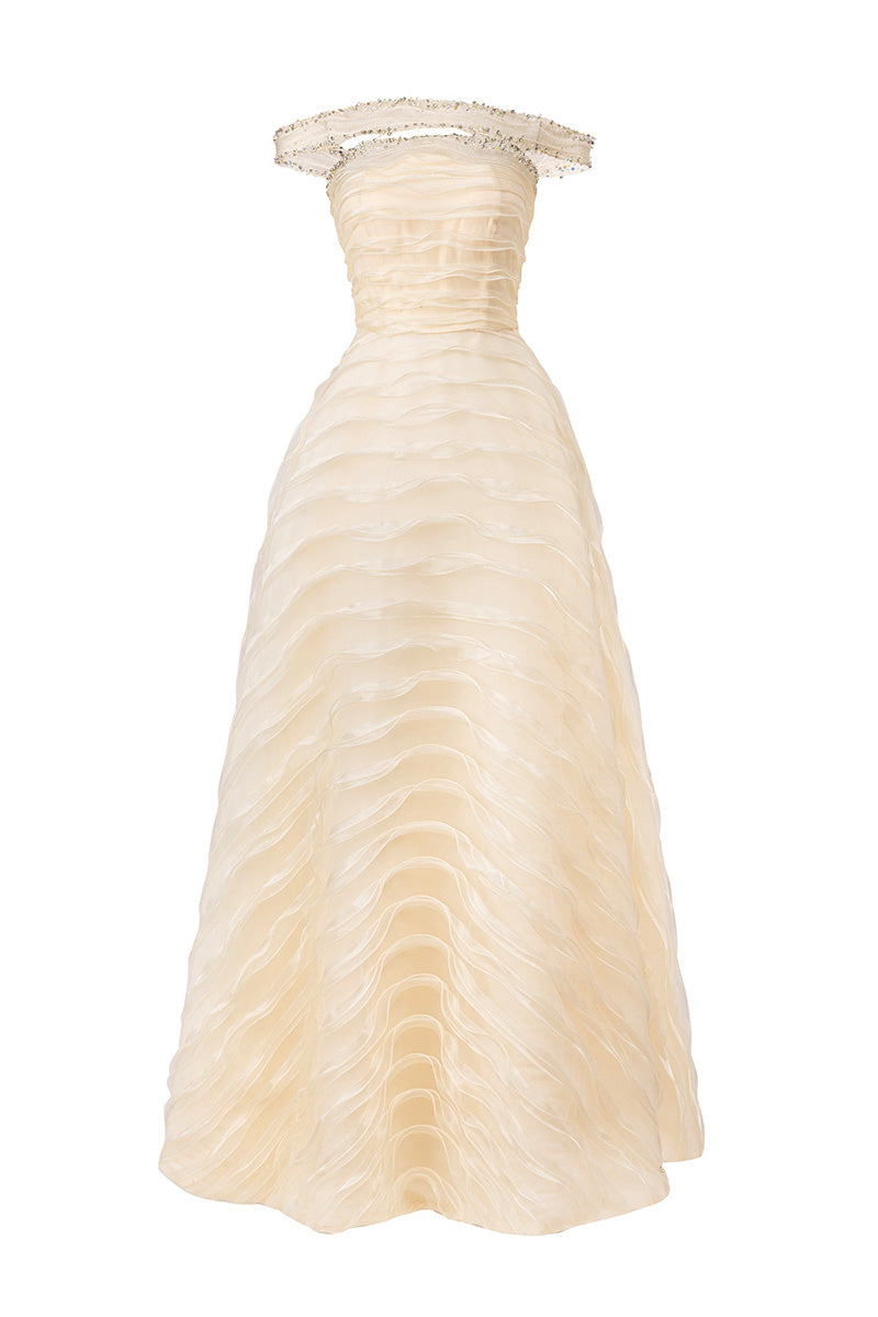 Beige light off-shoulder organza gown by HAPPY CLOTHING, featuring delicate fabric and elegant design for formal occasions.