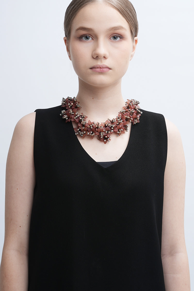 Aidan & Ice Peach Emilia Necklace featuring a delicate peach-colored pendant on a fine chain.