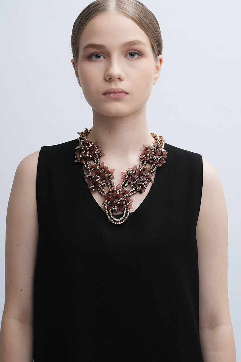 Aidan & Ice Peach Greta necklace featuring a delicate peach-colored pendant on a fine chain.
