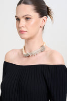 A model wearing the Pearls Dream Necklace by Aidan & Ice, featuring a delicate pearl necklace with elegant design.