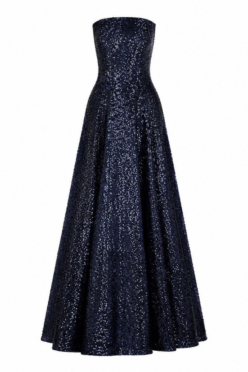 Nihan Peker Vertigo strapless gown in elegant fabric, featuring a fitted bodice and flowing skirt for formal occasions.