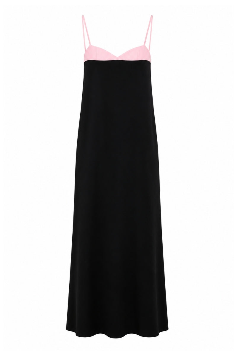 Elegant strapless Siena gown by Nihan Peker, showcasing flowing fabric and sophisticated design on a runway.
