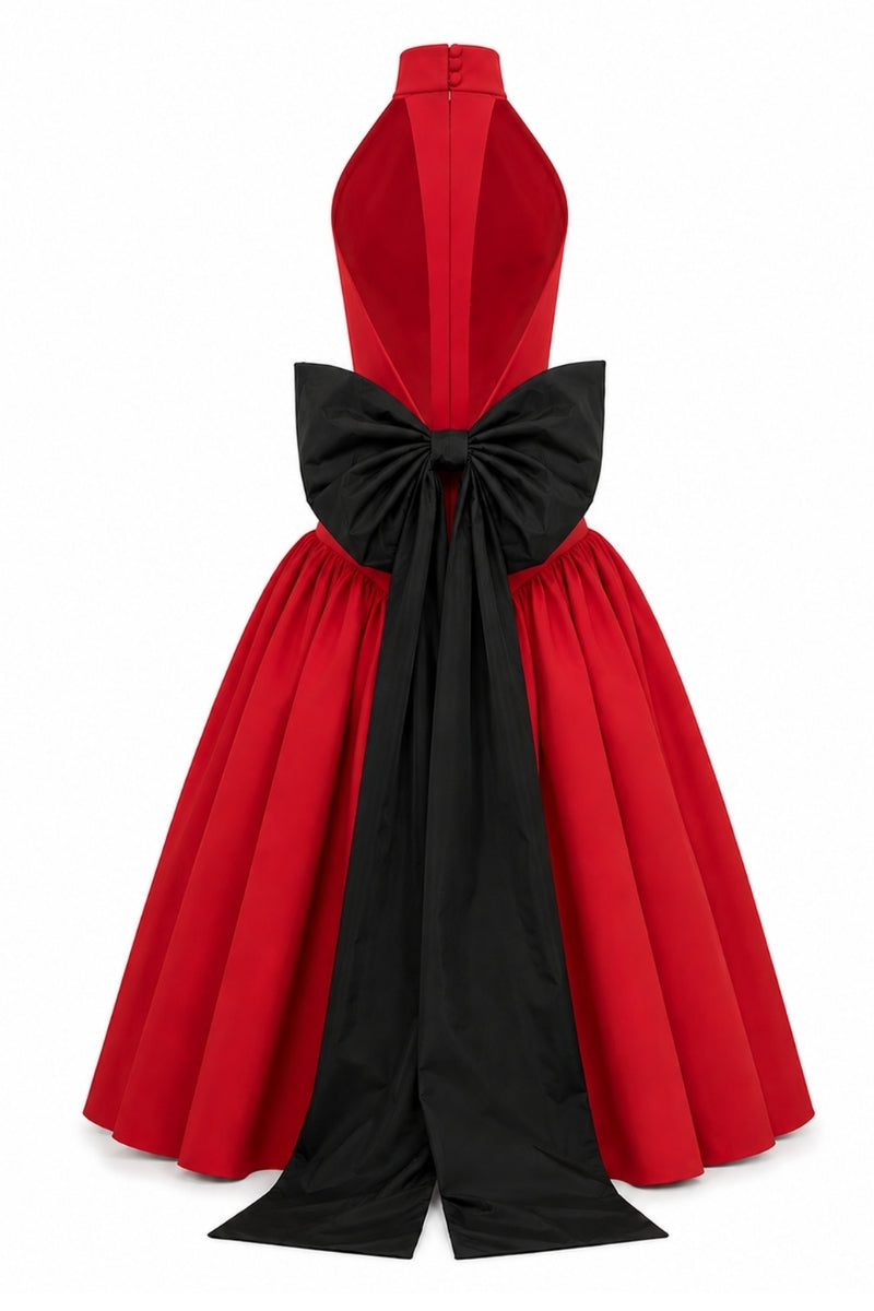 Elegant ÉVAN red gown by Nihan Peker featuring flowing fabric and a sophisticated silhouette, displayed on a model.