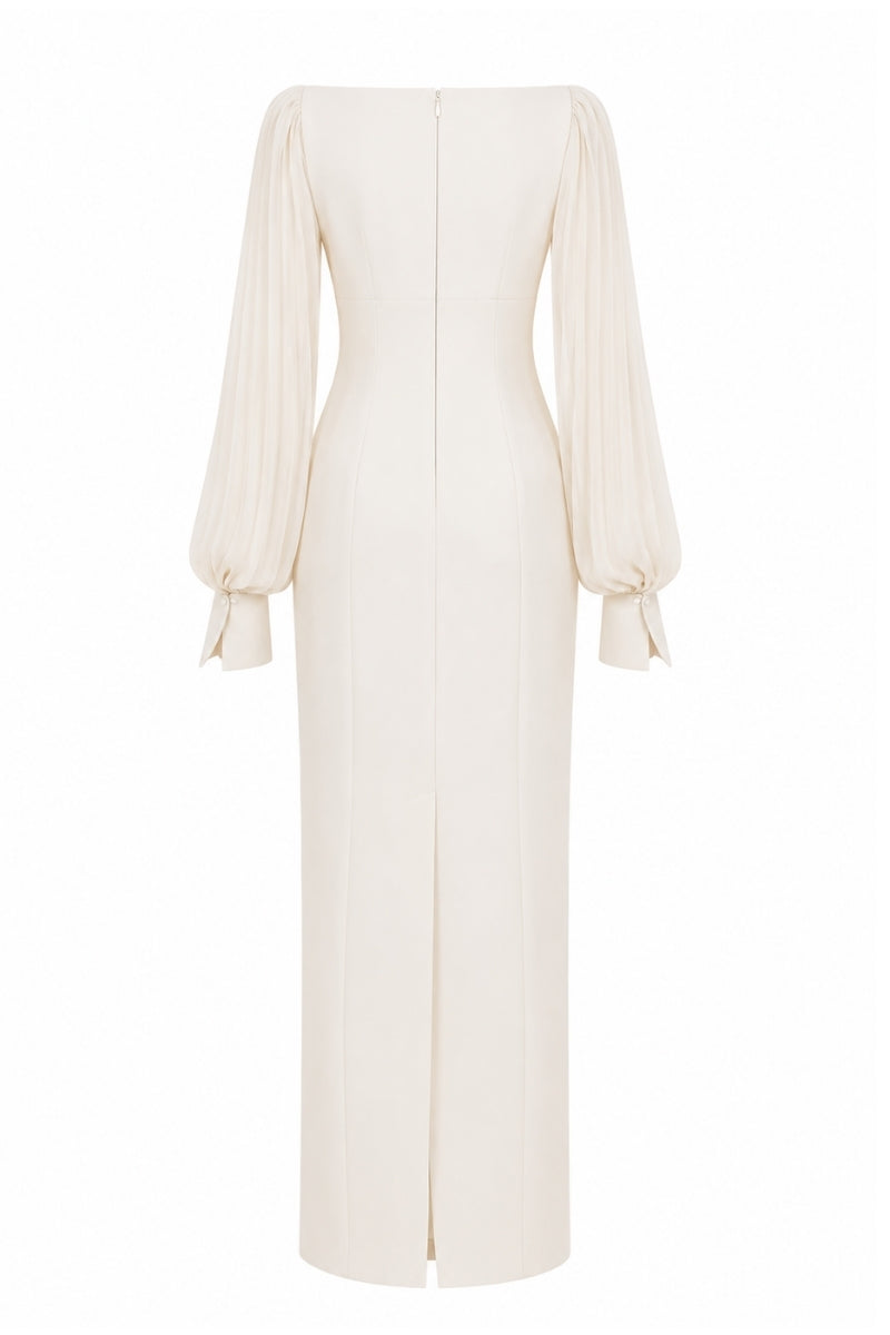 Nihan Peker NAVİGLİ gown featuring elegant fabric and intricate design, showcased on a model with stylish accessories.