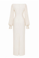 Nihan Peker NAVİGLİ gown featuring elegant fabric and intricate design, showcased on a model with stylish accessories.