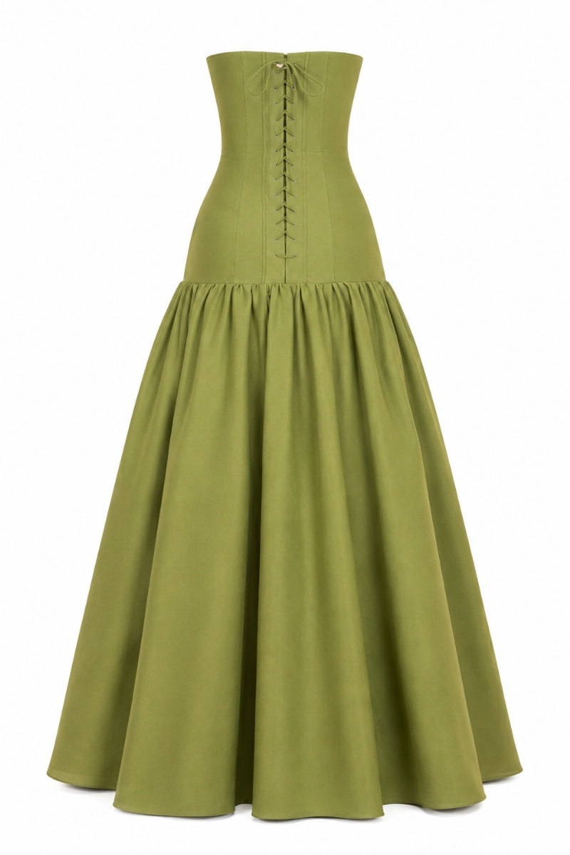 Nihan Peker Lizdress drop waist gown in flowing fabric with elegant design, showcased on a model against a neutral background.
