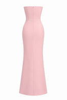 Pink cotton gown by Nihan Peker featuring soft fabric and a flowing design, displayed on a hanger.
